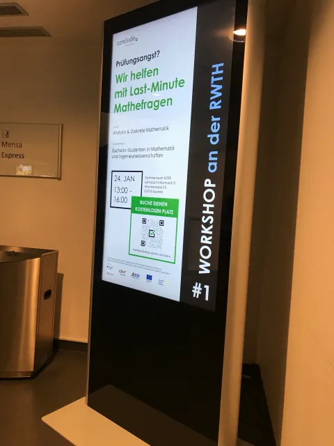 A concludio ad displaying in a big screen