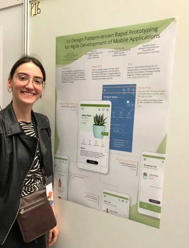 A photo of me smiling in front of the kiwi poster design that we presented in the MobileHCI'19 conference in Taipei
